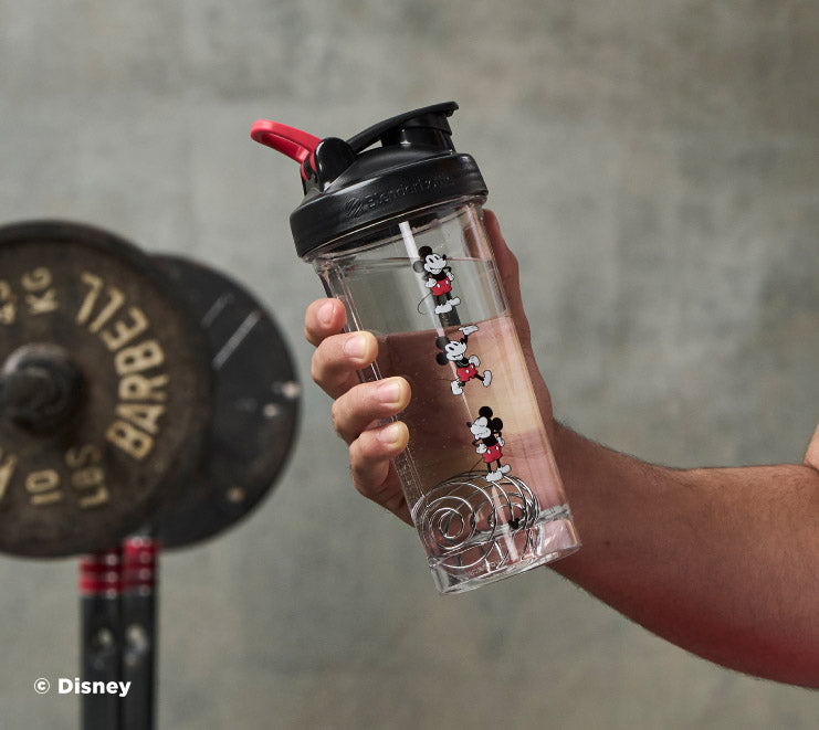 pro-series-e3 Mickey_Mouse_Protein_Shaker_Bottle_Being_Held_In_the_Gym.jpg
